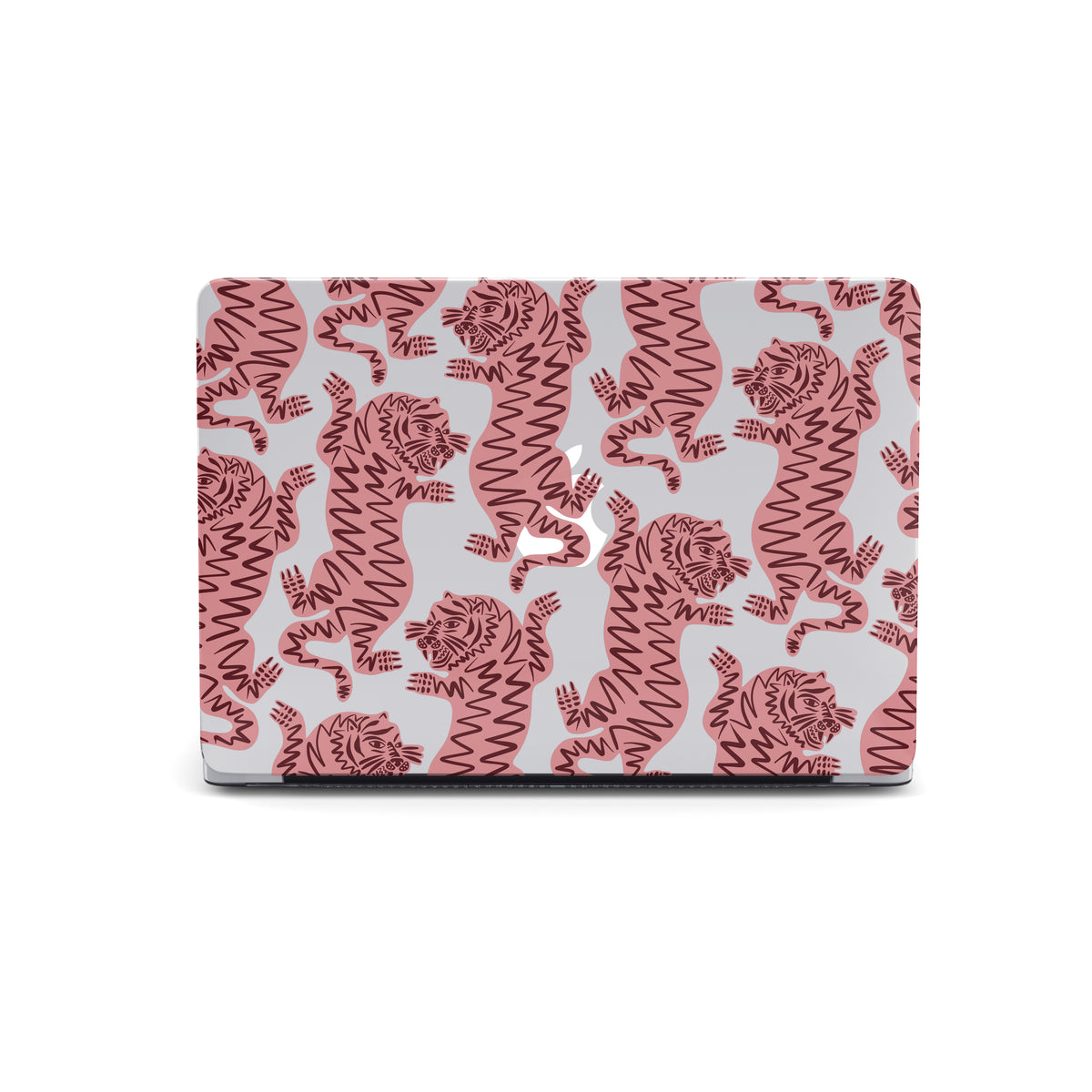 a laptop with a repeating pattern of pink and white tiger-like figures on its cover.