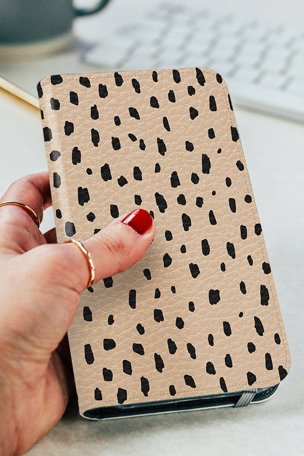 Wallet phone case with a beige background with hand-drawn polka dots 