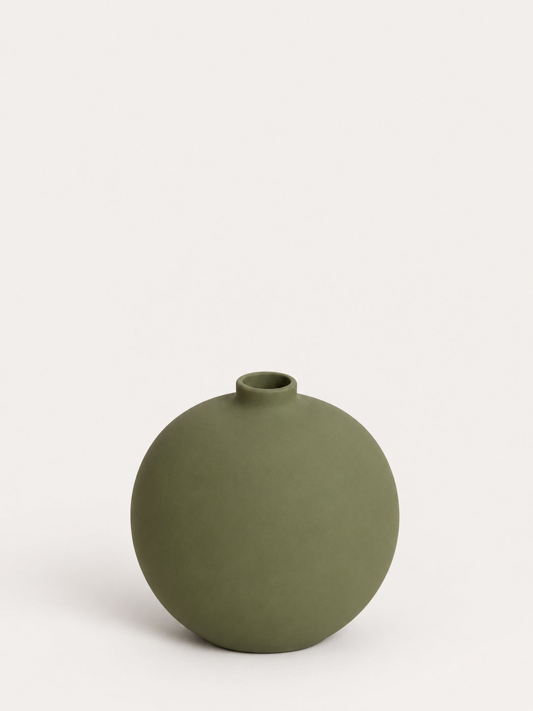A matte olive green ceramic vase with a small cylindrical neck and a rounded body, photographed on a clean off-white background.