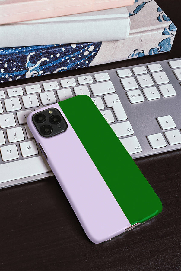 Phone case with a lilac and green colour block on a keyboard