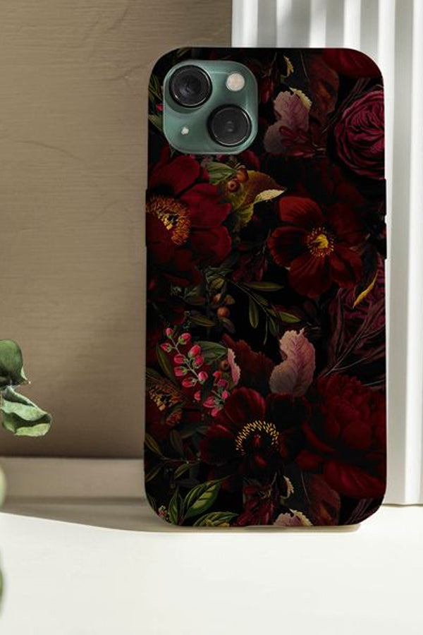 Phone case with a dark floral desighs with red flowers on a neutral background