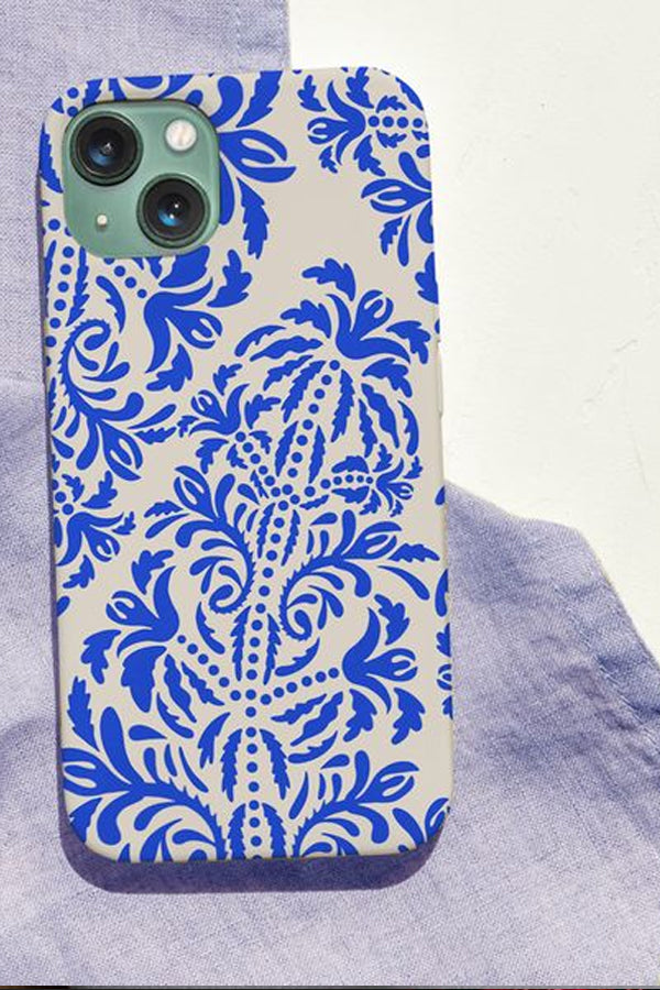 Phone case with a blue floral pattern