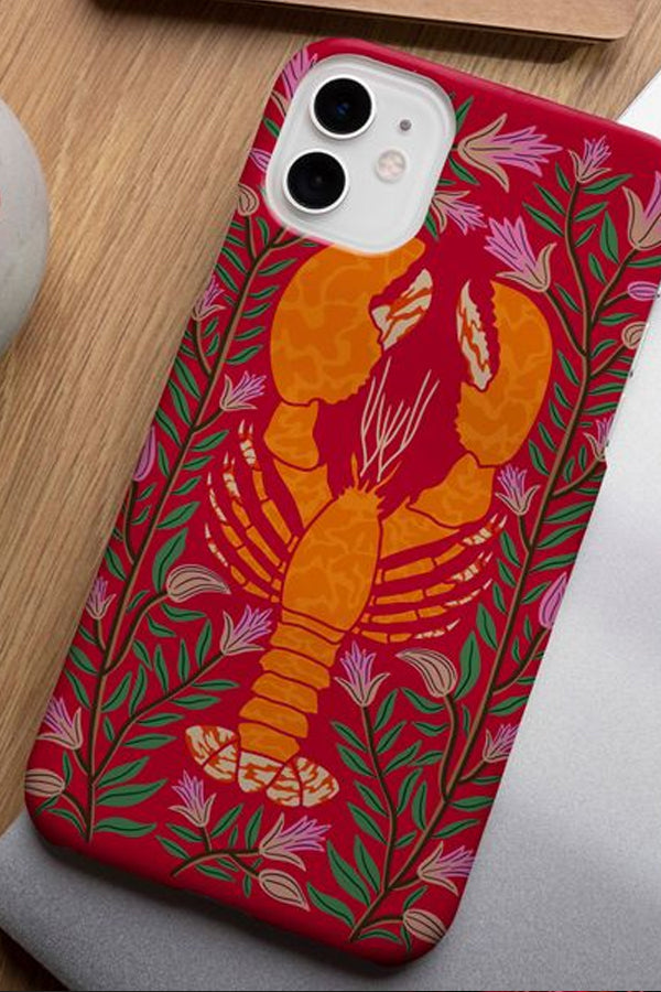 Phone case with a lobster design on a red background