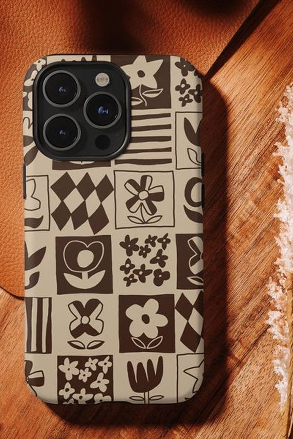 Phone case with a grid pattern with doodle flowers