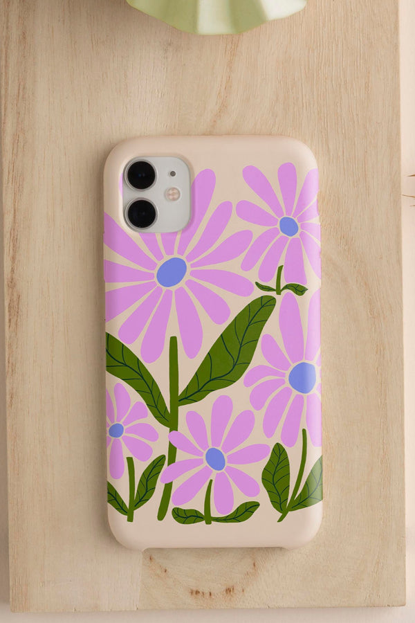 Phone case with a floral design on a wooden background