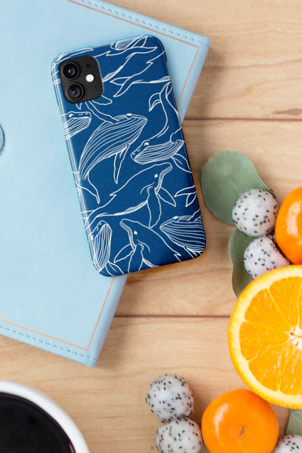 Phone case with a blue humpback whale pattern 