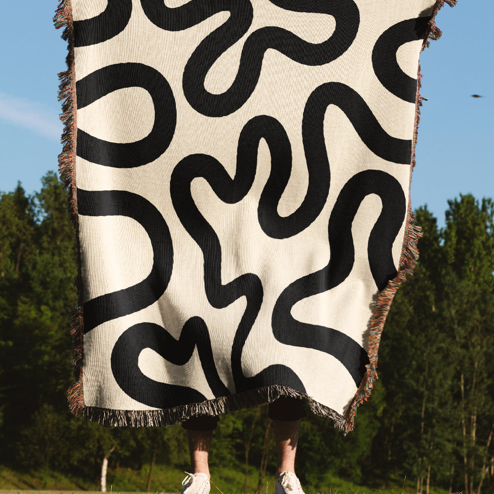 
                  
                    Swirl Lines Abstract Jacquard Woven Blanket (Peach Black) | Harper & Blake
                  
                