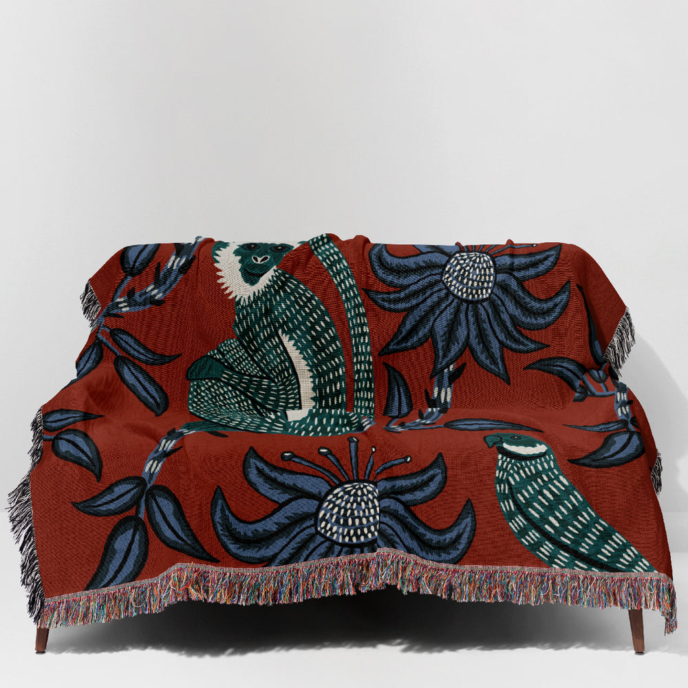 
                  
                    Monkey Parrot Jacquard Woven Blanket (Red) | Harper & Blake
                  
                