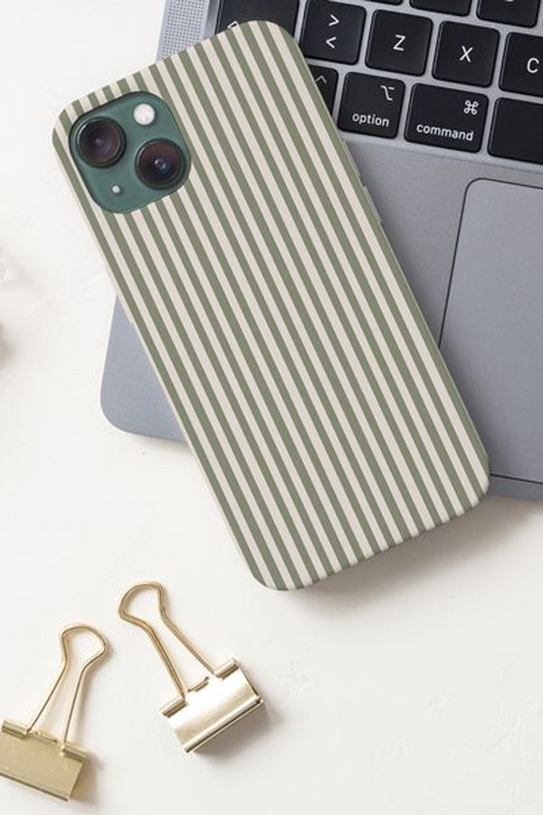 Phone case with a green and beige striped design on a laptop