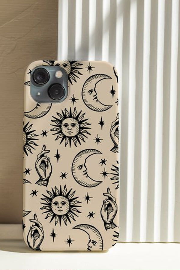 Phone case with black wood-block inspired illustration of hands, stars, sun and moons