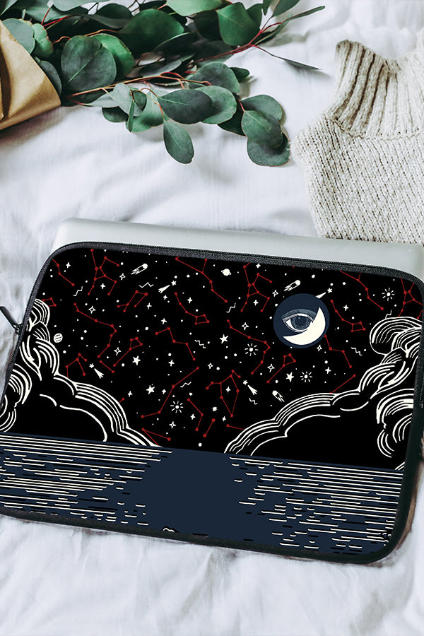 Abstract laptop sleeve with a celestial design on it with constellations, the sea and clouds