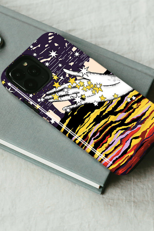 Phone case with a mystical celestial design on a grey notebook
