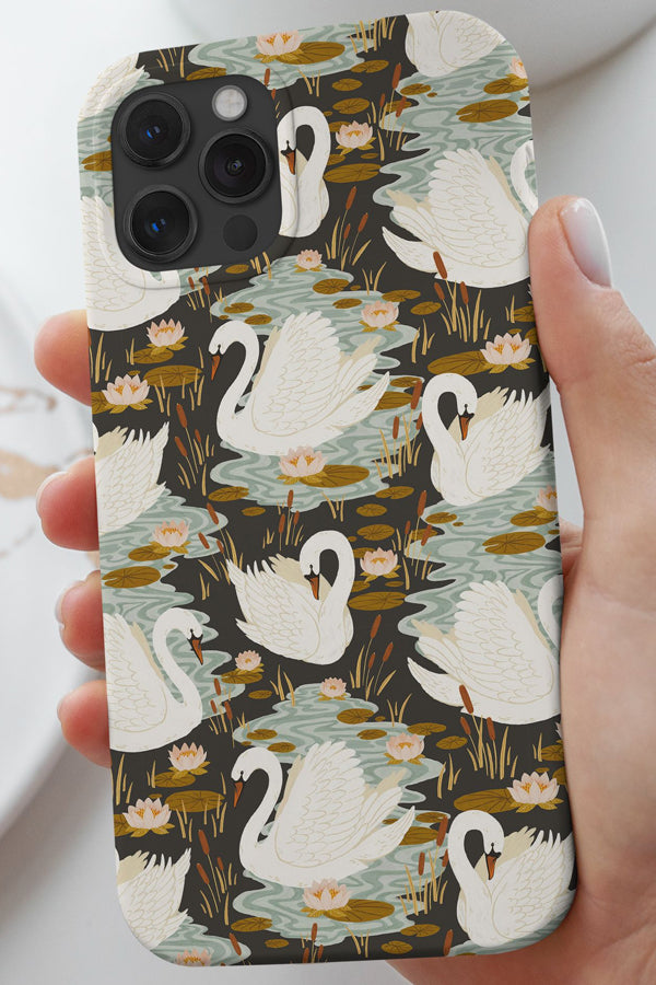 Phone case with a detailed swan design with water, lilypads and pond plants