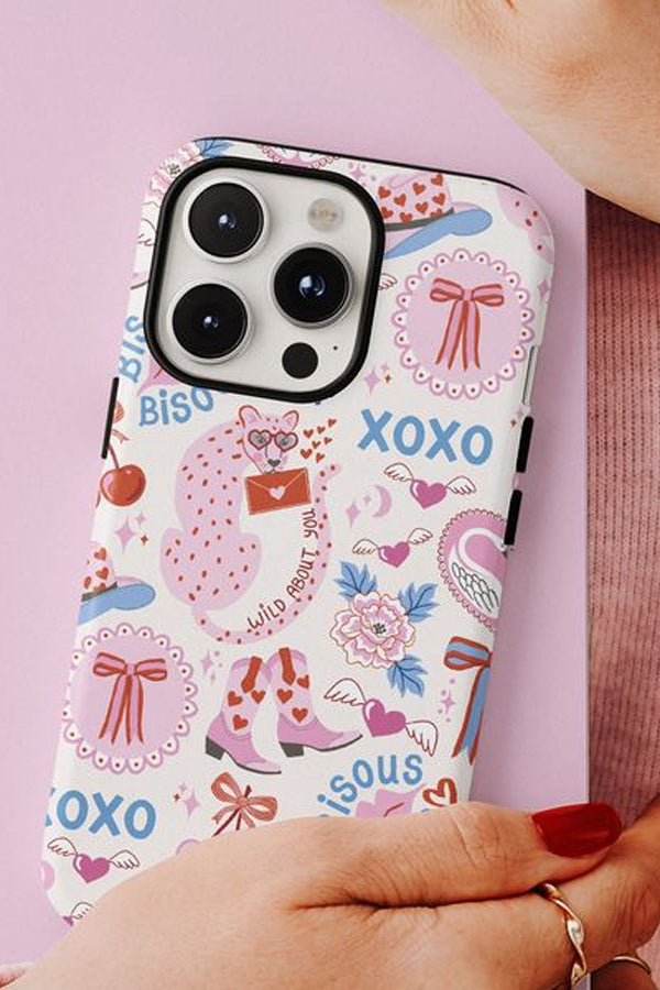 Phone case with a retro design with leopards, hearts, bows and cowboy boots