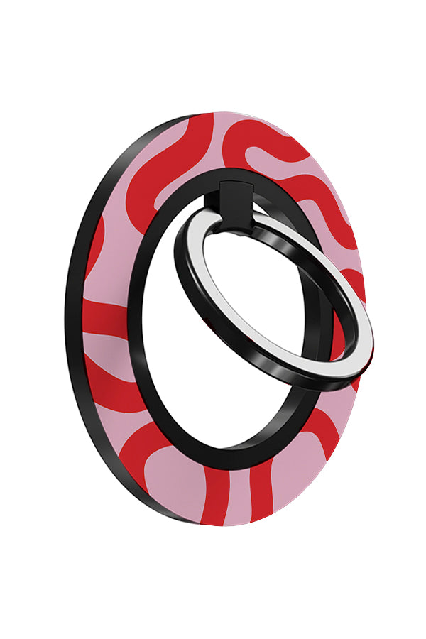 swirl lines magnetic phone ring holder angled with swirling shapes in pink and red