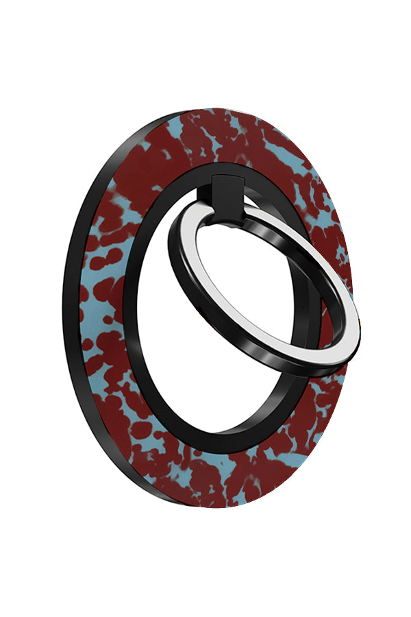 Tortoise print magnetic phone ring holder angled with a red and blue tortoise print