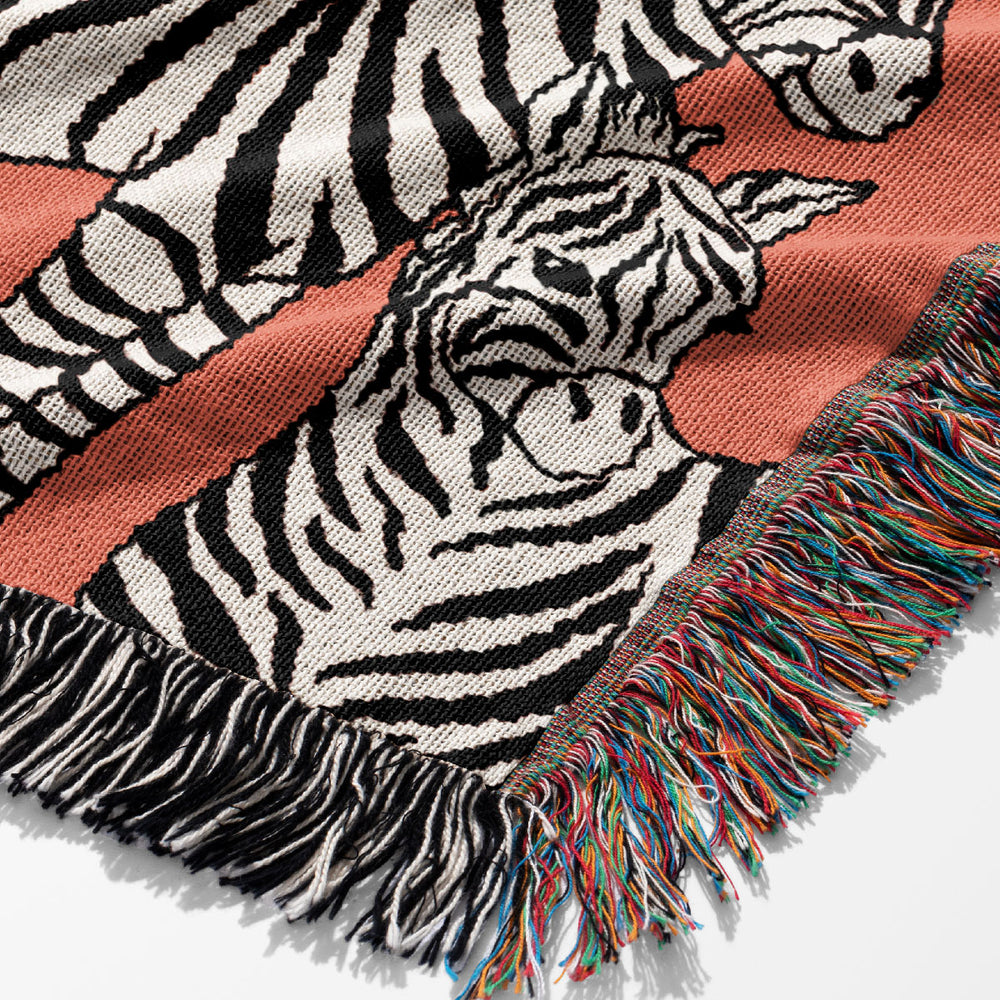 
                  
                    Zebra Pattern Jacquard Woven Blanket (Pink) | Harper & Blake
                  
                