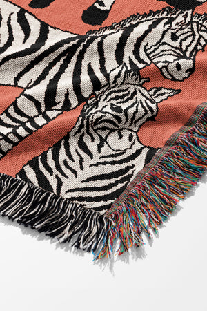 Zebra Pattern Jacquard Woven Blanket (Pink) | Harper & Blake