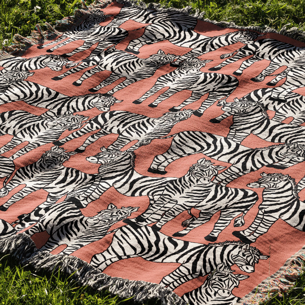 
                  
                    Zebra Pattern Jacquard Woven Blanket (Pink) | Harper & Blake
                  
                